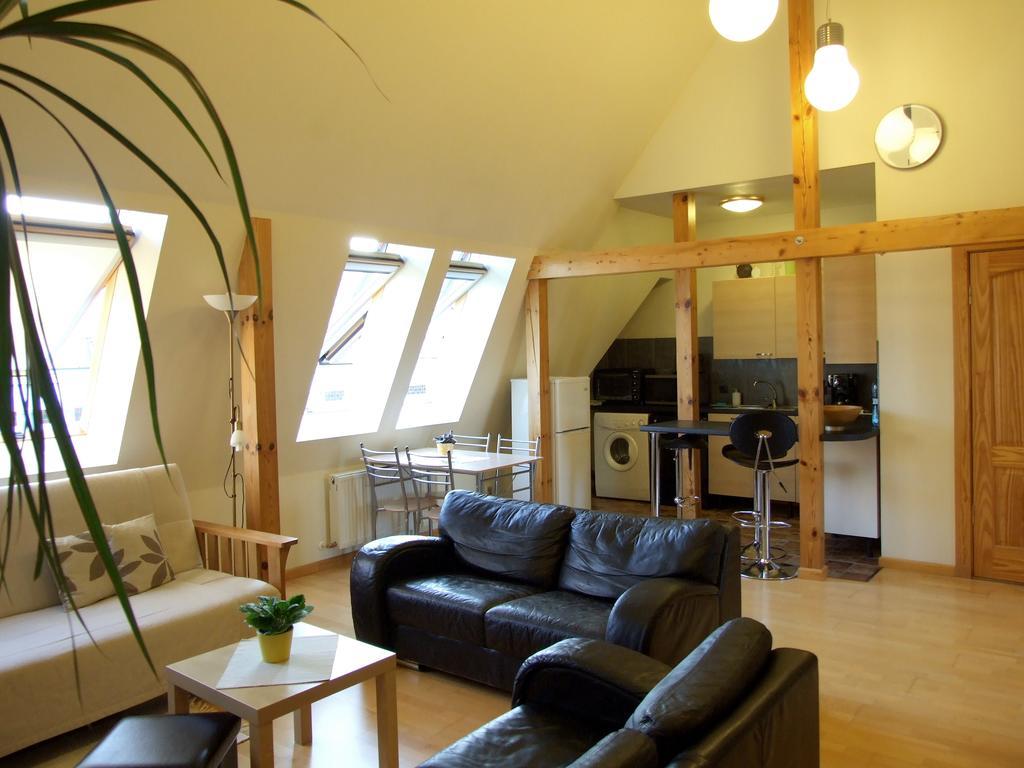 Sunlit Loft Apartment Riga Værelse billede